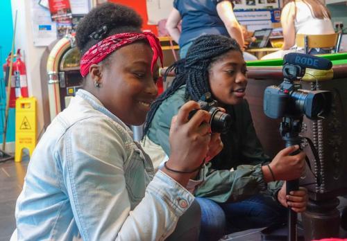 Naomi is practicing her photography by observing some of the JMU students’ skills.