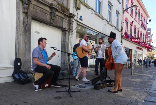 Naomi's love for music is enhanced by living in Galway because of all the street performers.